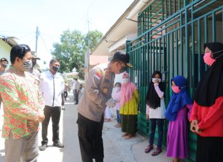 Polda Kepri mengadakan Bakti Sosial Peduli Covid 19 Bagi Masyarakat Kepri