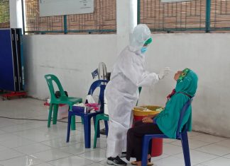 Kantor Desa Tanjung Baru melaksanan Swap masal COVID-19 Kepada Warganya